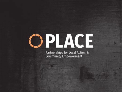 The image displays the word PLACE in large white letters, with an orange circular logo to the left. Below, in smaller text, it says Partnerships for Local Action & Community Empowerment on a dark textured background.